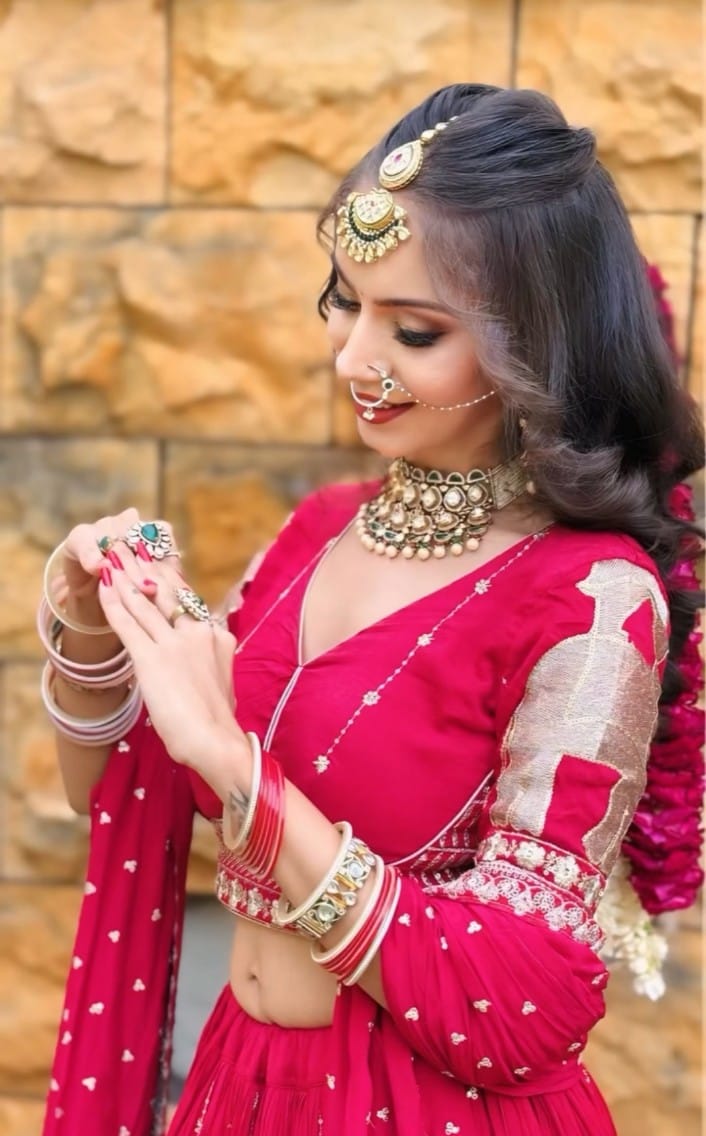Bridal side-style with curls and traditional jewelry