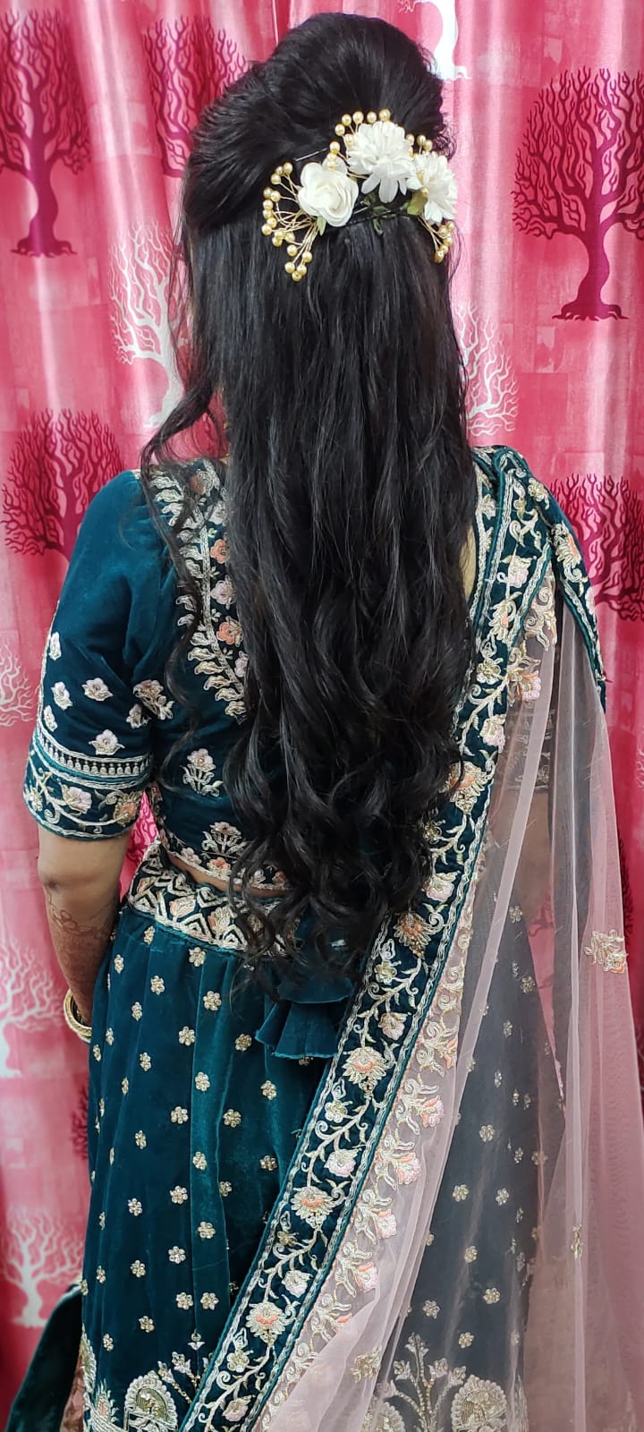 Long dark hair with floral hair accessories